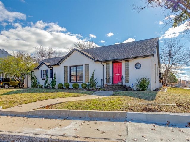 2832 NW 45th St, Oklahoma City, OK 73112 - view of front of property with stucco siding and a front yard