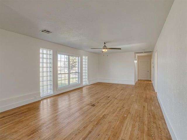 2832 NW 45th St, Oklahoma City, OK 73112 - spare room featuring light wood finished floors and a ceiling fan