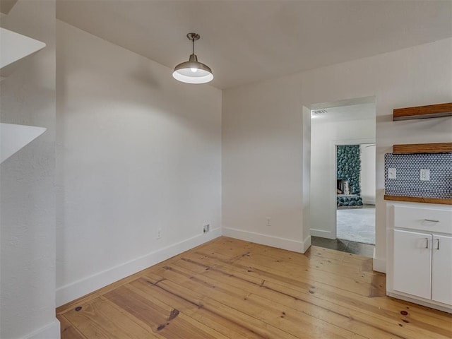 2832 NW 45th St, Oklahoma City, OK 73112 - unfurnished dining area featuring light wood finished floors and baseboards