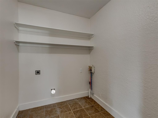 2832 NW 45th St, Oklahoma City, OK 73112 - laundry room with baseboards and electric dryer hookup