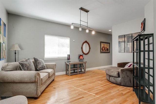 living room with light hardwood / wood-style floors