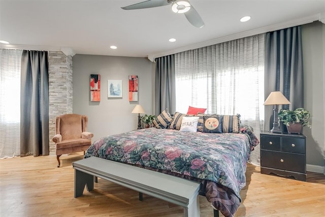 bedroom featuring ceiling fan and hardwood / wood-style floors