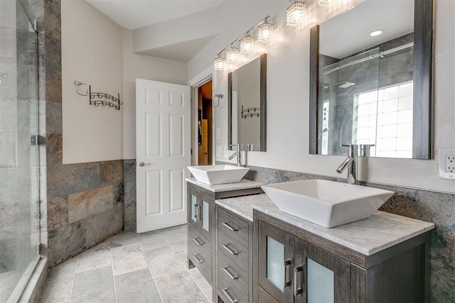 bathroom featuring vanity and walk in shower