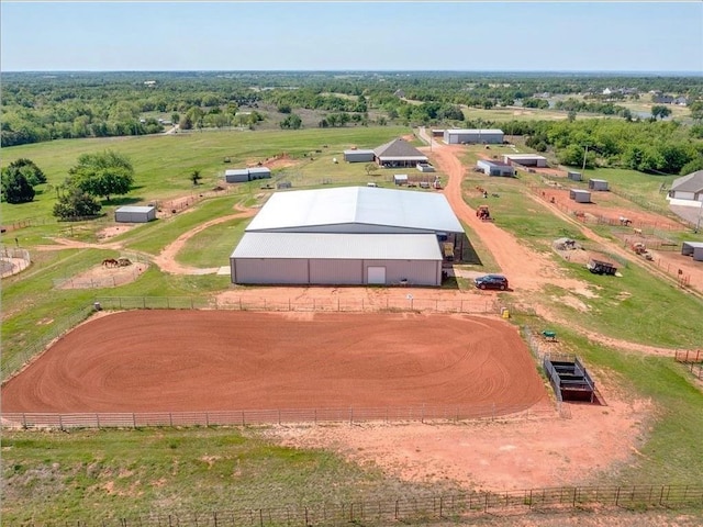 birds eye view of property featuring a rural view