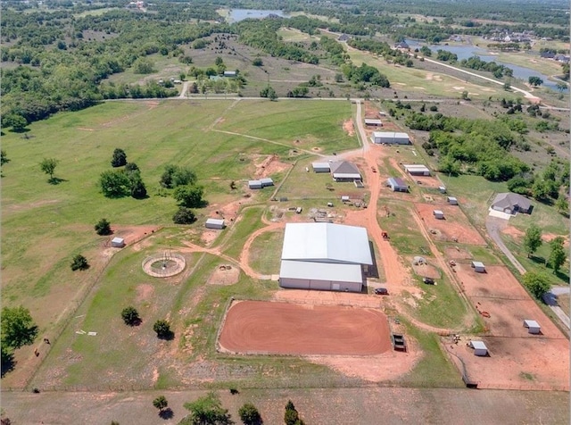 aerial view with a rural view and a water view