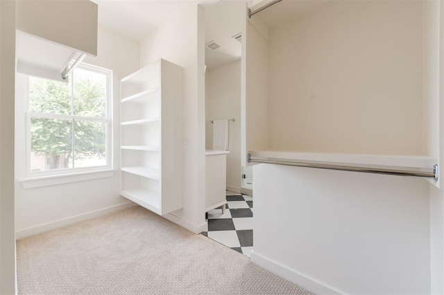 walk in closet featuring tile patterned floors