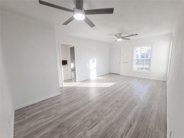 unfurnished room with light hardwood / wood-style floors