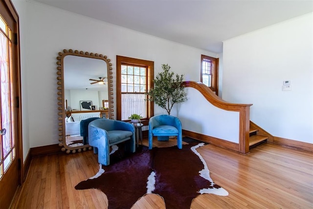 sitting room featuring light hardwood / wood-style flooring