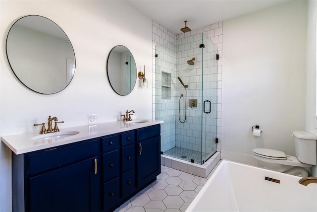 full bathroom with shower with separate bathtub, tile patterned floors, vanity, and toilet