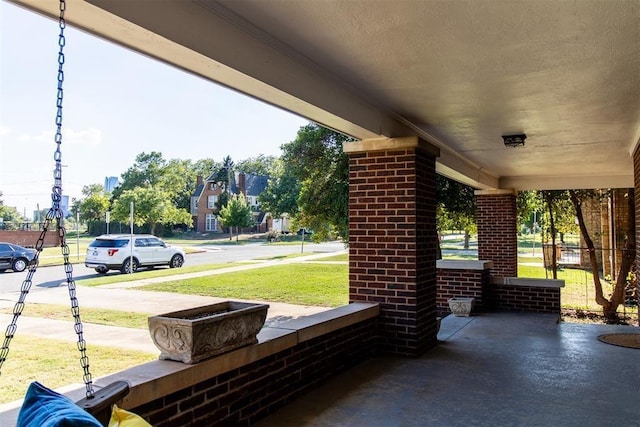 view of patio featuring a porch