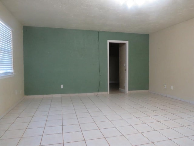 view of tiled spare room