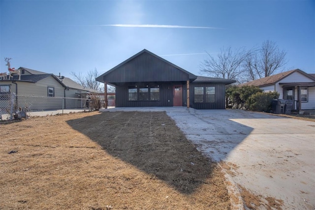 modern farmhouse style home with a carport