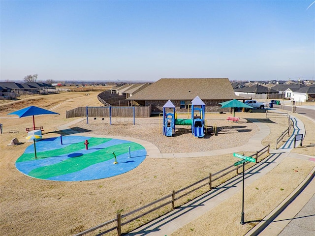 view of home's community with a playground