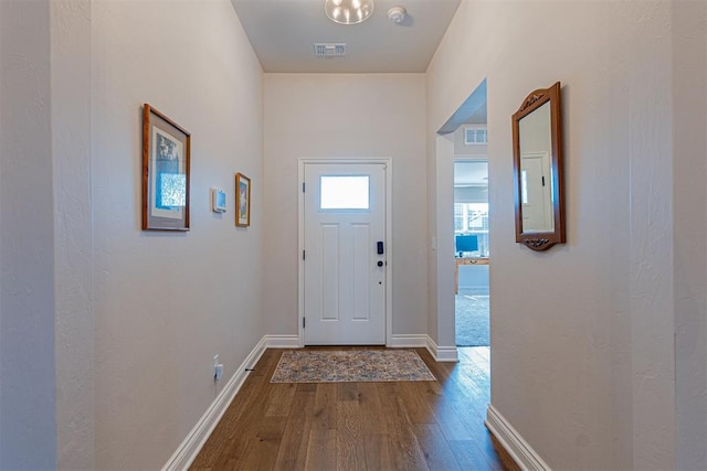 doorway featuring hardwood / wood-style flooring