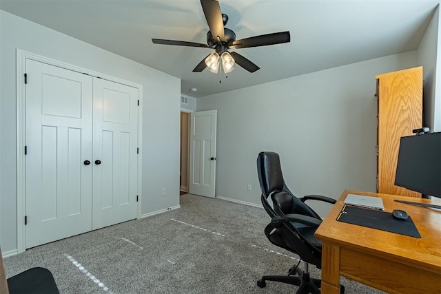 office space with ceiling fan and carpet floors