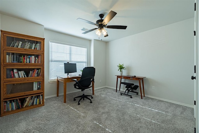 office with ceiling fan and light carpet