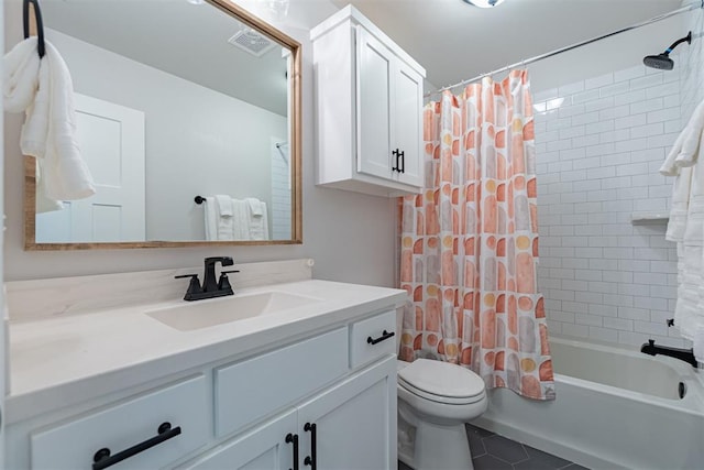 full bathroom with tile patterned floors, vanity, shower / bathtub combination with curtain, and toilet