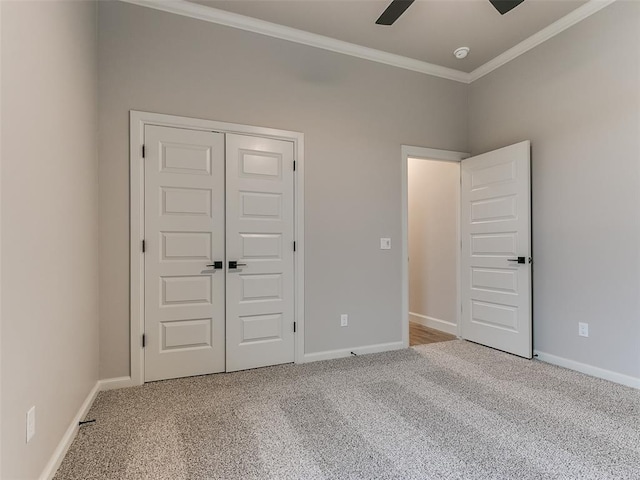 unfurnished bedroom with light carpet, a closet, crown molding, and ceiling fan