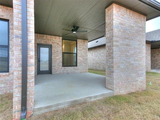 view of patio featuring ceiling fan