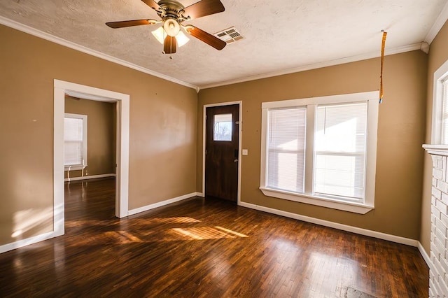 entryway featuring a textured ceiling, dark hardwood / wood-style flooring, ceiling fan, and crown molding