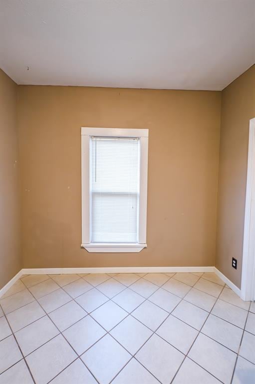 view of tiled spare room