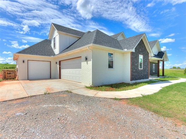 view of side of home featuring a garage