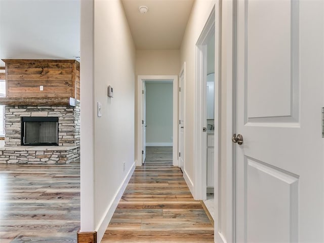 corridor featuring light hardwood / wood-style flooring