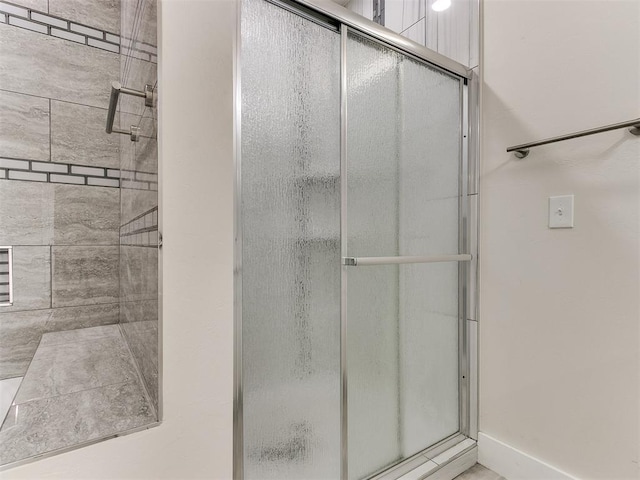 bathroom featuring walk in shower