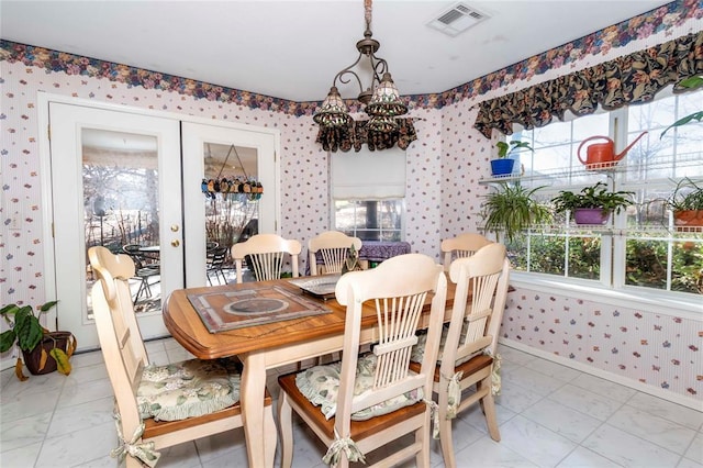 dining room featuring french doors