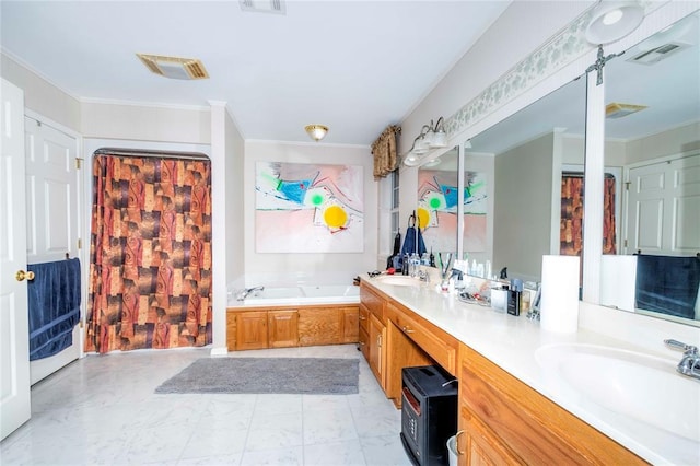 bathroom featuring ornamental molding, vanity, and a tub