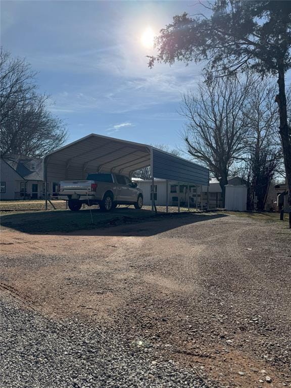 exterior space with a carport