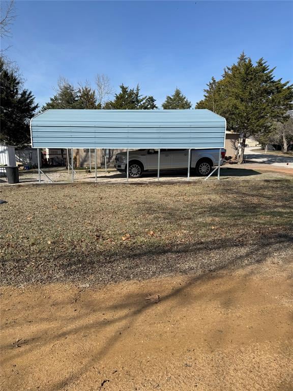 view of parking / parking lot with a carport