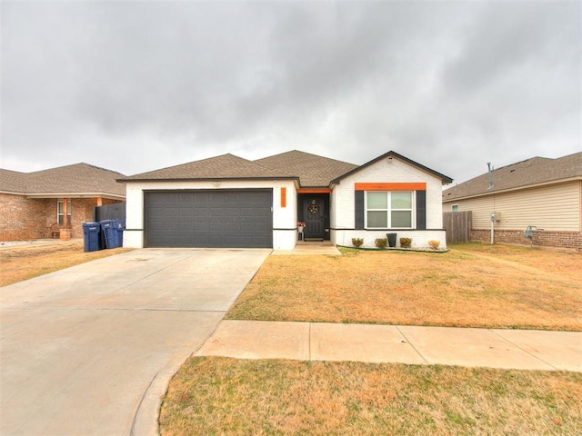 ranch-style house featuring a garage