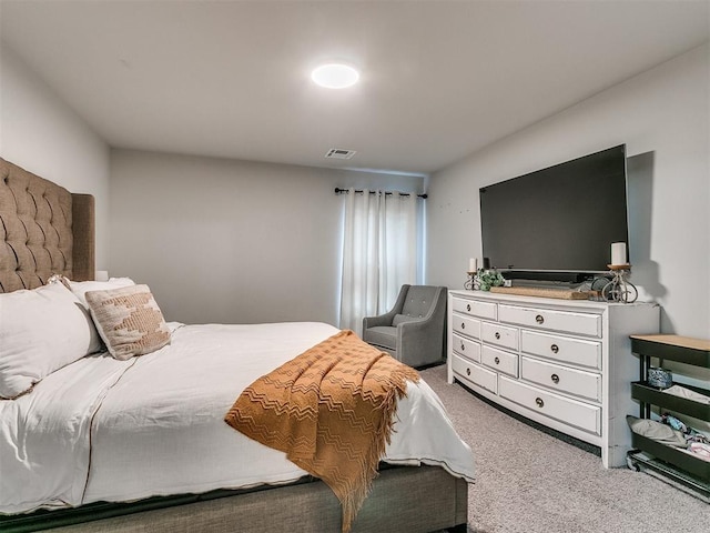 bedroom featuring carpet