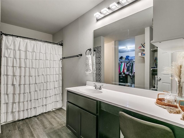 bathroom featuring hardwood / wood-style floors and vanity