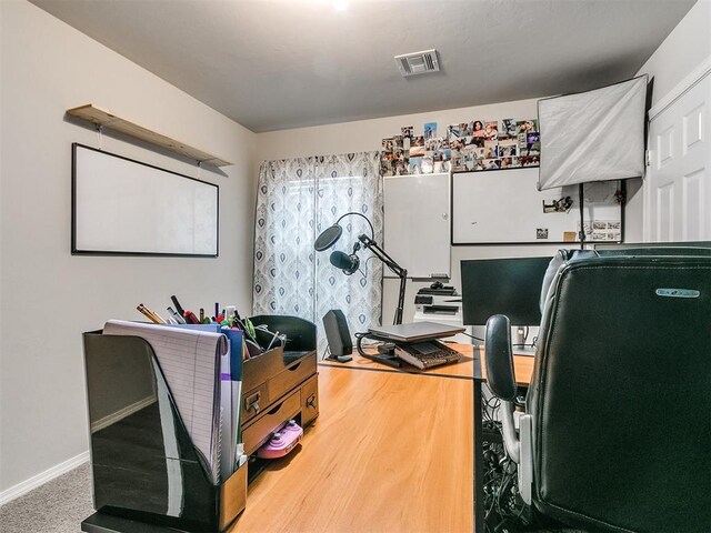 view of carpeted home office