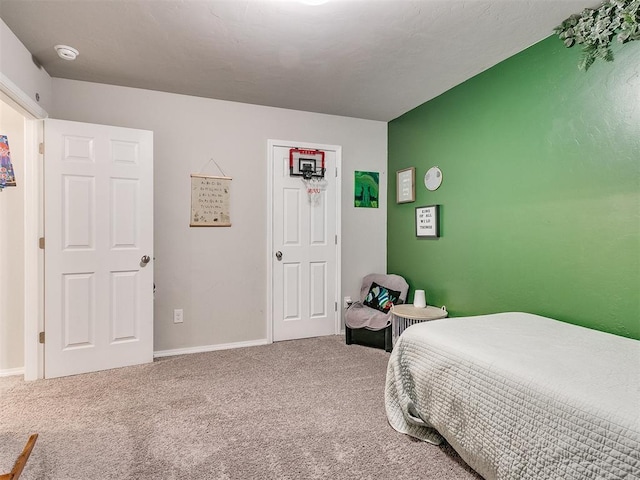 bedroom featuring carpet flooring