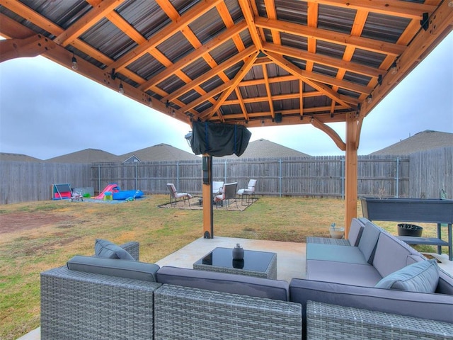 view of patio featuring a gazebo and an outdoor living space