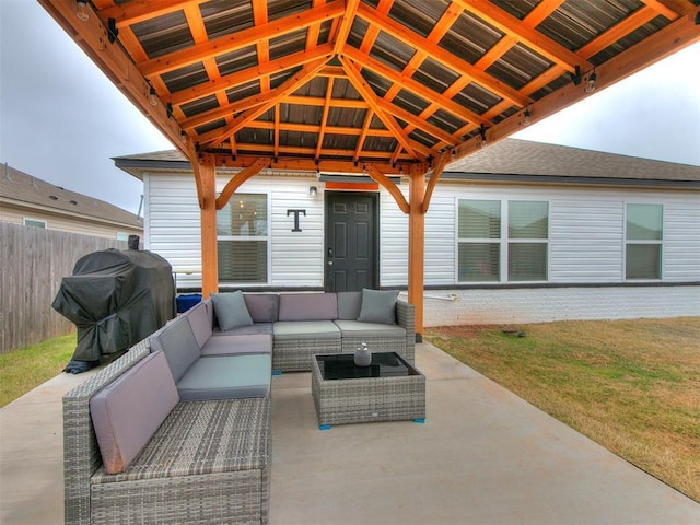 view of patio featuring outdoor lounge area, a gazebo, and a grill