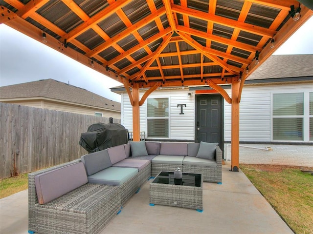 view of patio / terrace with outdoor lounge area, a gazebo, and grilling area