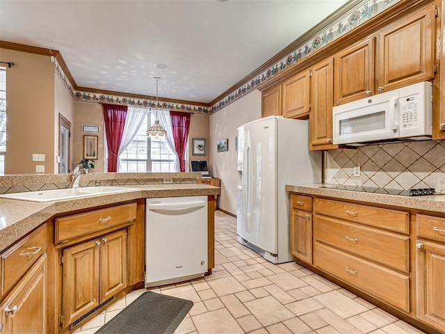 kitchen with tasteful backsplash, sink, hanging light fixtures, crown molding, and white appliances