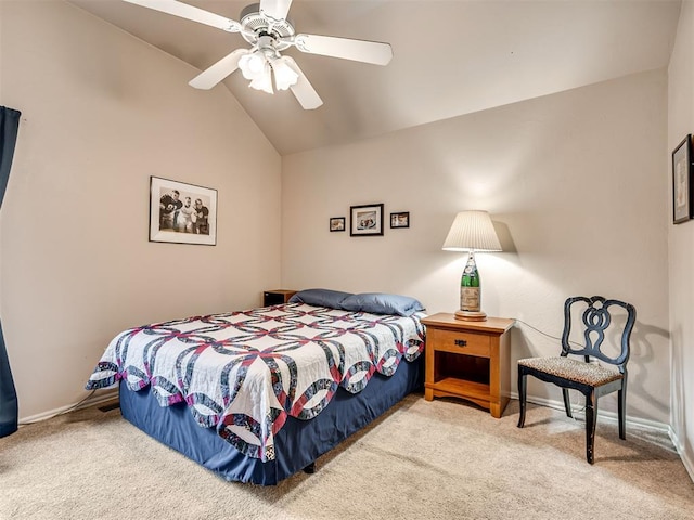 carpeted bedroom with lofted ceiling and ceiling fan