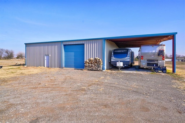 garage with a carport