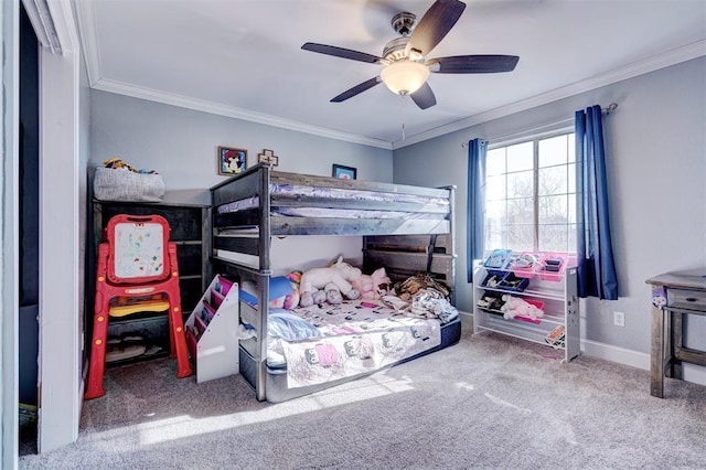 bedroom with ceiling fan, carpet, and ornamental molding