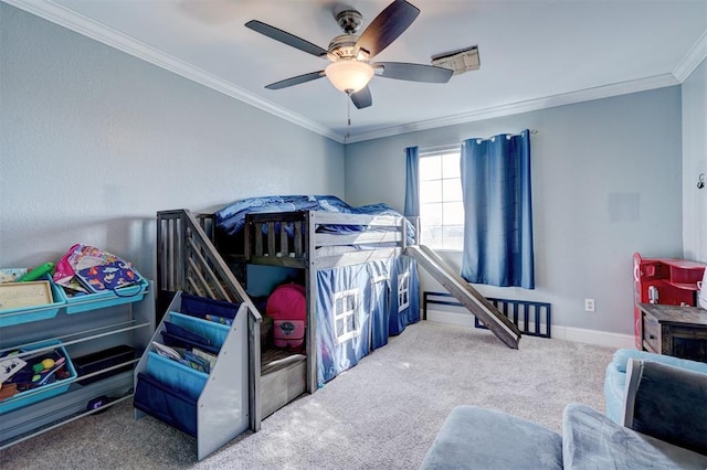 bedroom with ceiling fan, carpet floors, and crown molding