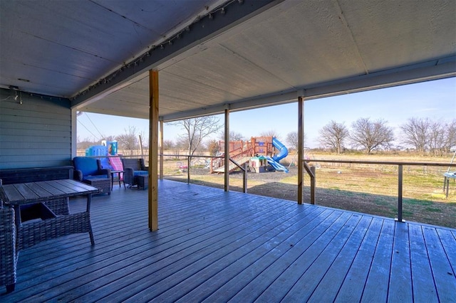 wooden deck with a playground