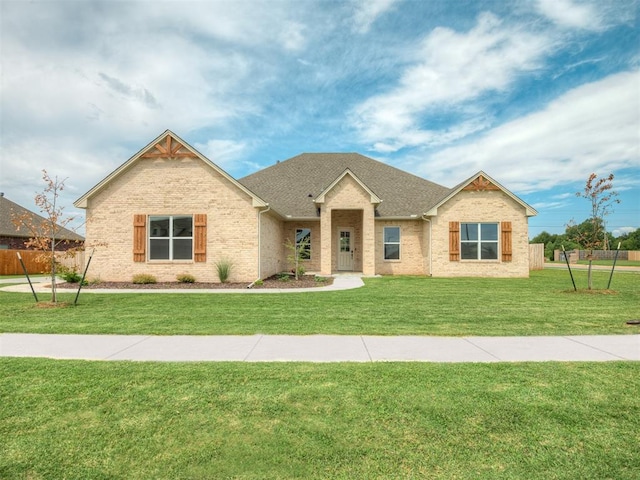 craftsman inspired home with a front yard