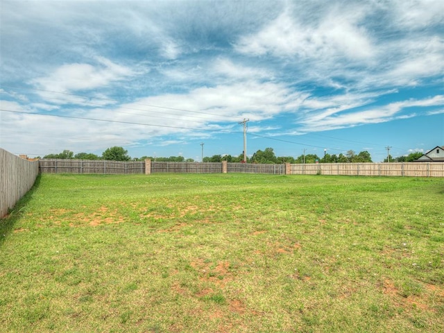 view of yard featuring a fenced backyard