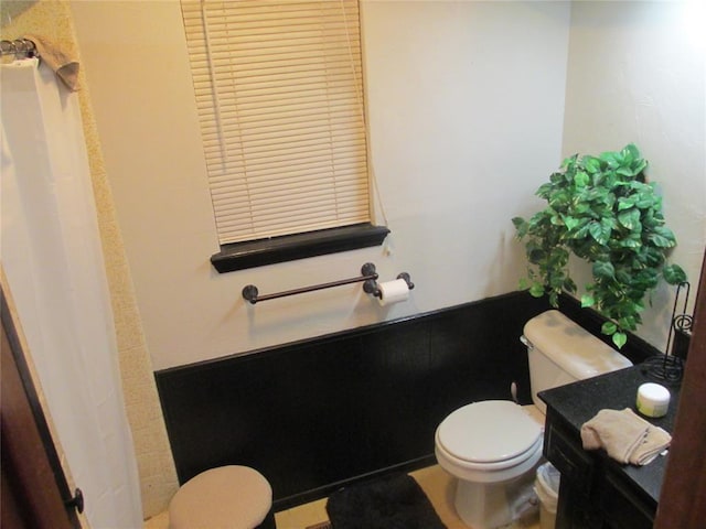 bathroom featuring toilet