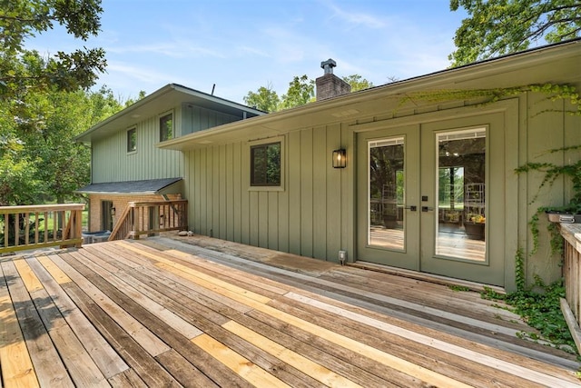 wooden deck featuring french doors